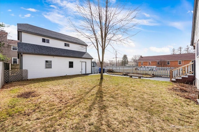 view of yard featuring a fenced backyard