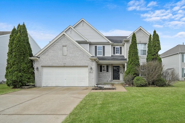 traditional-style home with driveway, brick siding, and a front lawn