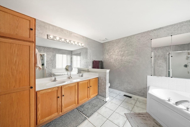 full bath with double vanity, a sink, a bath, and a shower stall