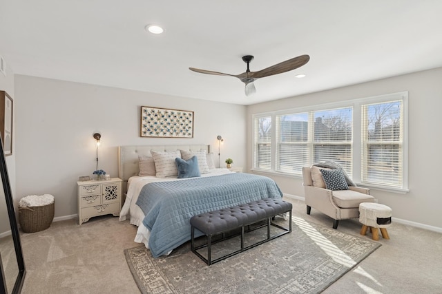 bedroom featuring recessed lighting, baseboards, a ceiling fan, and light colored carpet