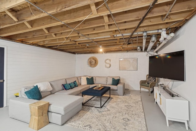 living area with concrete floors