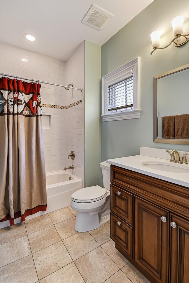 full bath with vanity, visible vents, shower / tub combo, tile patterned floors, and toilet