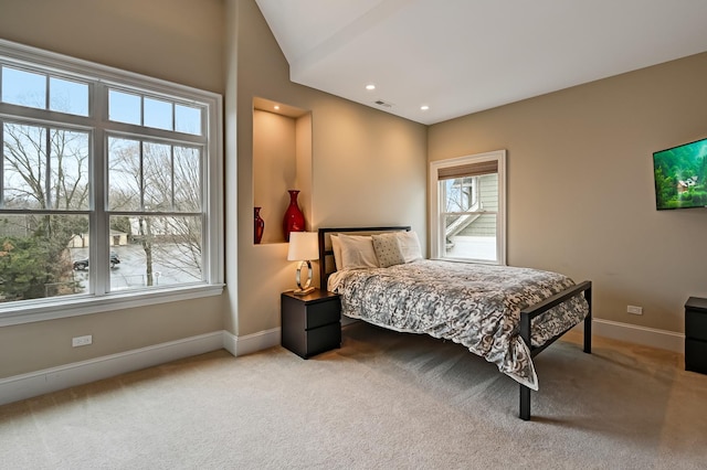 carpeted bedroom featuring recessed lighting, visible vents, and baseboards