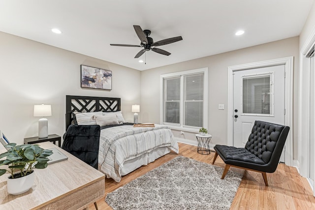 bedroom featuring a ceiling fan, light wood-type flooring, baseboards, and recessed lighting