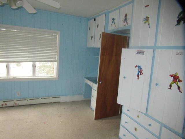 bedroom with a baseboard radiator