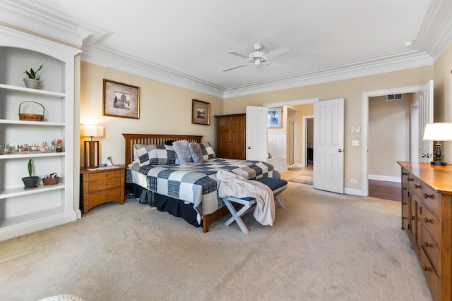 bedroom featuring baseboards, visible vents, ceiling fan, light carpet, and crown molding