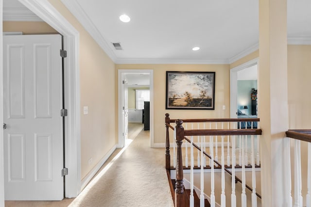 corridor featuring recessed lighting, an upstairs landing, visible vents, and ornamental molding