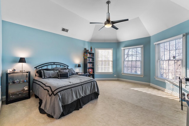 bedroom featuring visible vents, carpet flooring, baseboards, ceiling fan, and vaulted ceiling