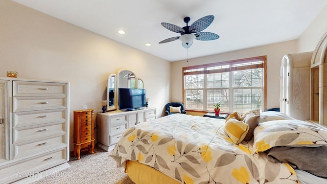 bedroom with recessed lighting, ceiling fan, and light colored carpet