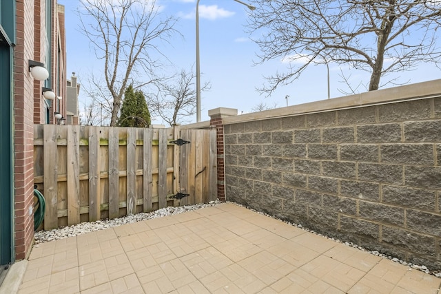 view of patio / terrace with fence