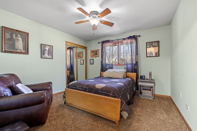 carpeted bedroom featuring a ceiling fan, a closet, and baseboards