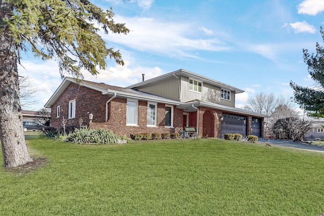 view of front of house with aphalt driveway, a garage, a front lawn, and brick siding