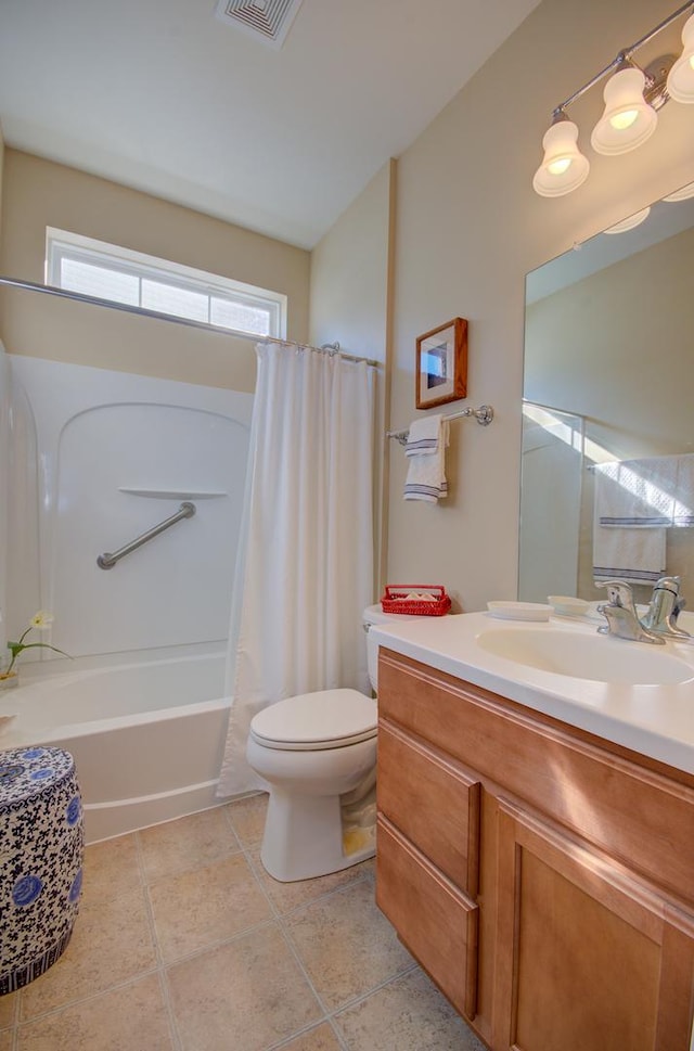 full bathroom featuring tile patterned floors, visible vents, toilet, shower / bath combo, and vanity