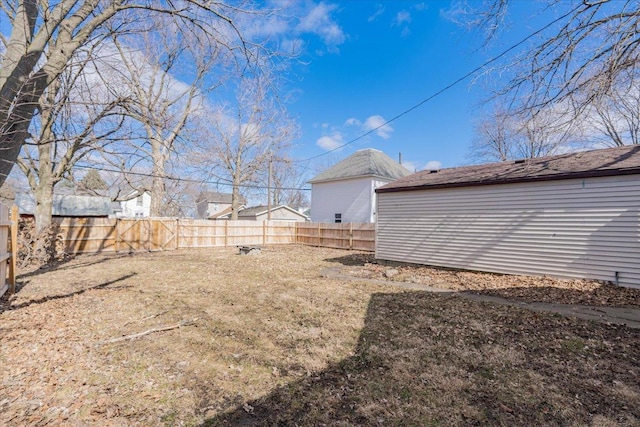 view of yard with a fenced backyard