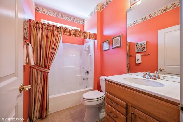 bathroom with shower / tub combination, vanity, toilet, and tile patterned floors