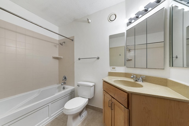 full bathroom with tub / shower combination, a textured ceiling, vanity, toilet, and tile patterned floors