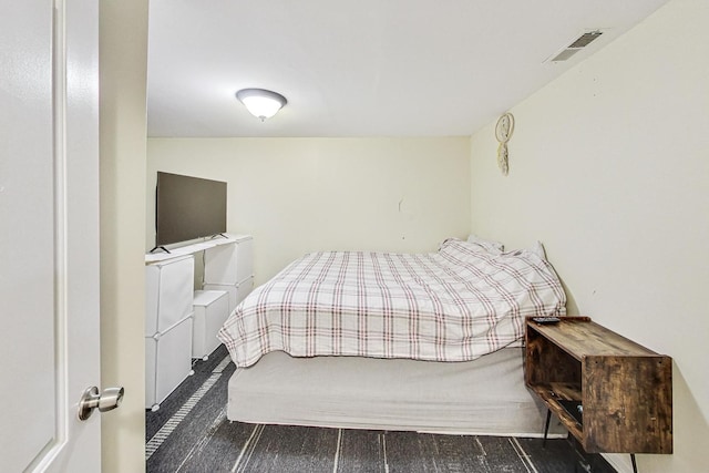 bedroom with visible vents