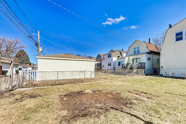 exterior space with fence and a residential view