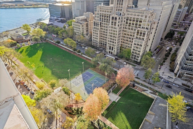 drone / aerial view featuring a water view and a city view