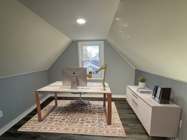 home office featuring vaulted ceiling and dark wood finished floors