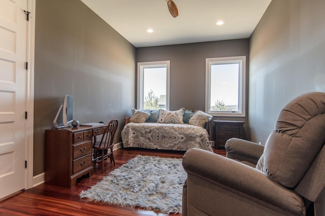 bedroom featuring recessed lighting, dark wood-style floors, and baseboards