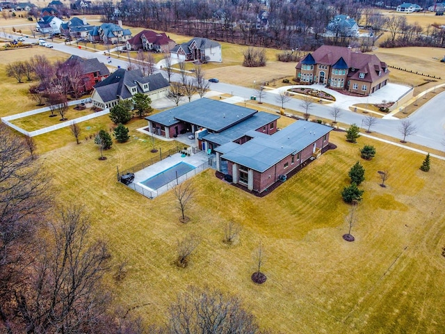 birds eye view of property with a residential view