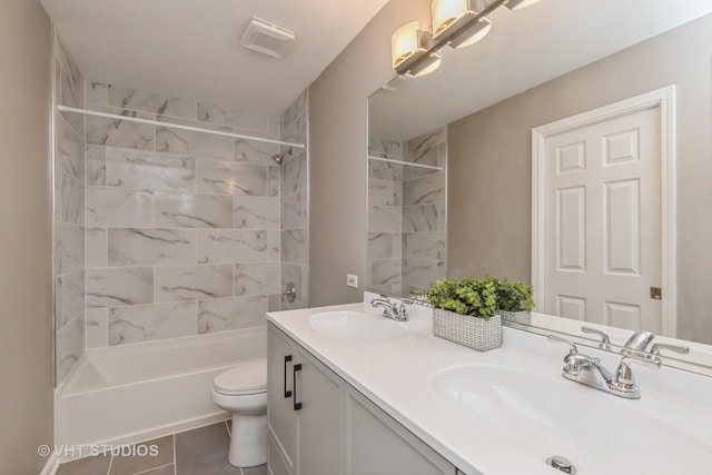 bathroom with toilet, double vanity, a sink, and shower / bathing tub combination