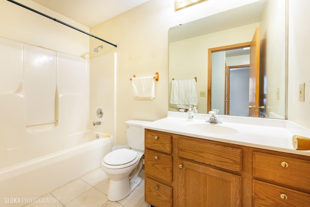 full bathroom featuring shower / bathtub combination, vanity, toilet, and tile patterned floors