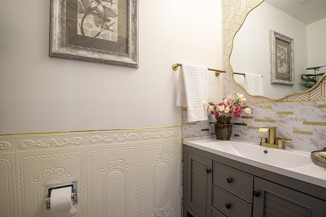 bathroom featuring wainscoting and vanity