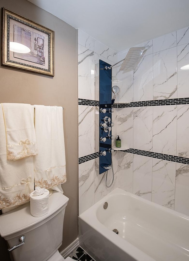 full bathroom featuring toilet and bathing tub / shower combination