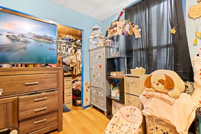 interior space with a closet and wood finished floors