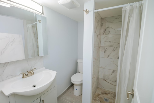 full bathroom with toilet, a shower stall, and vanity