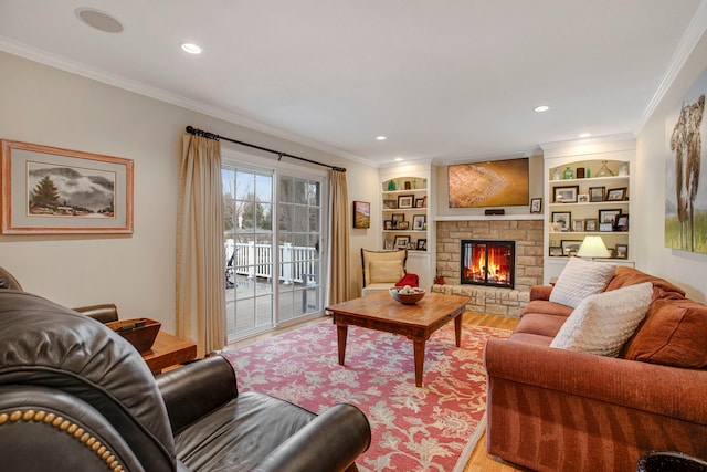 living room featuring recessed lighting, light wood-style flooring, ornamental molding, and a stone fireplace