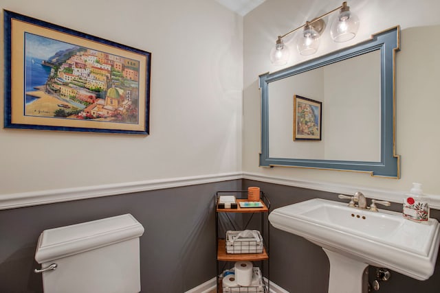 bathroom featuring a sink and toilet