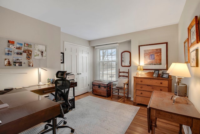 office space with wood finished floors