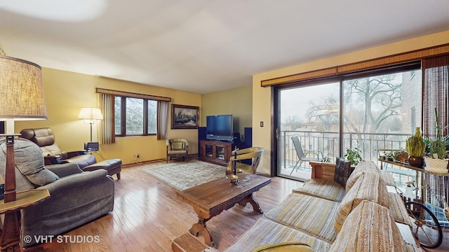 living room with wood finished floors