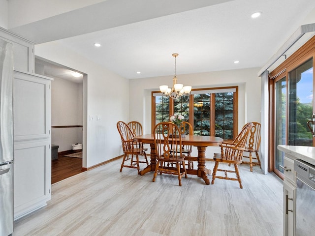 dining room with a chandelier, recessed lighting, light wood-style flooring, and baseboards