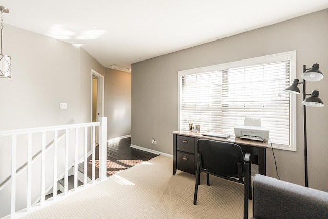 office featuring carpet floors and baseboards