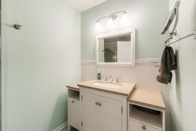 bathroom with backsplash and vanity