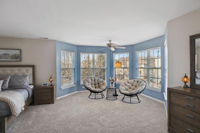 bedroom featuring carpet flooring, ceiling fan, visible vents, and baseboards