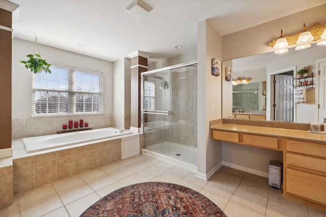 full bath with a garden tub, tile patterned flooring, vanity, visible vents, and a shower stall