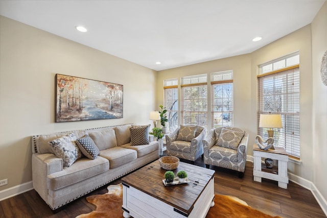 living room with dark wood-style floors, recessed lighting, and baseboards