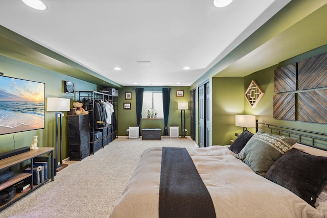 bedroom featuring baseboards, carpet floors, and recessed lighting