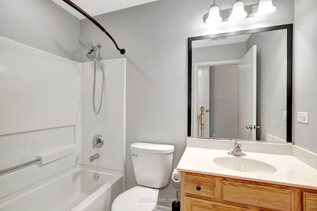 full bath with toilet,  shower combination, and vanity