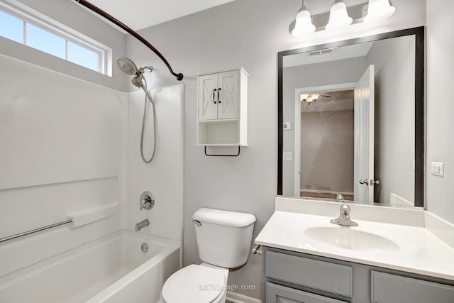 full bathroom with toilet, washtub / shower combination, visible vents, and vanity