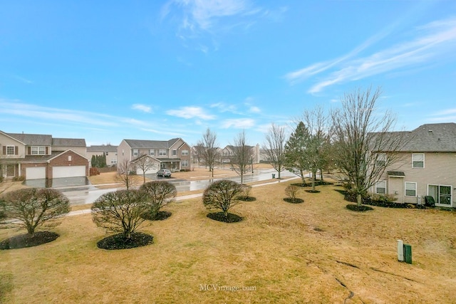 view of yard featuring a residential view