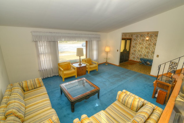 living room with lofted ceiling, baseboards, and carpet floors