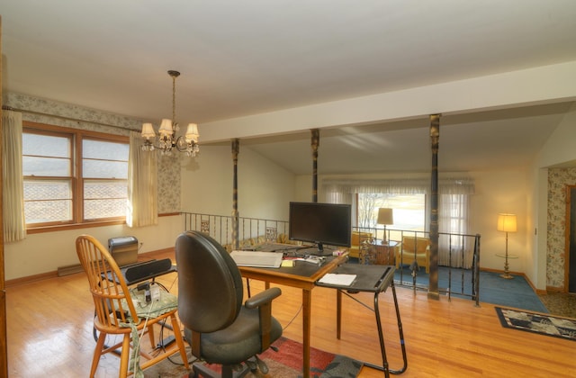 office featuring an inviting chandelier, wood finished floors, and baseboards