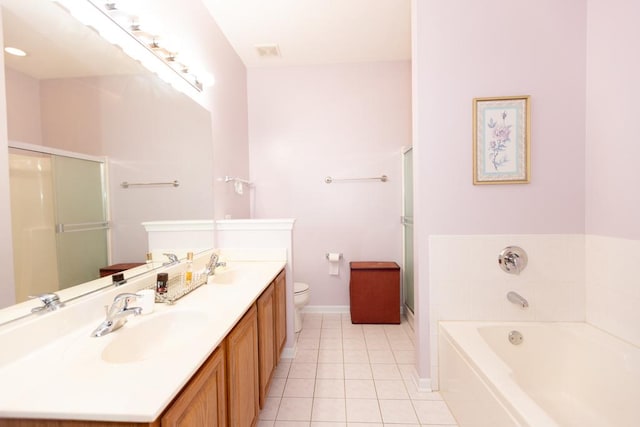 bathroom featuring a garden tub, tile patterned flooring, a sink, and a shower stall