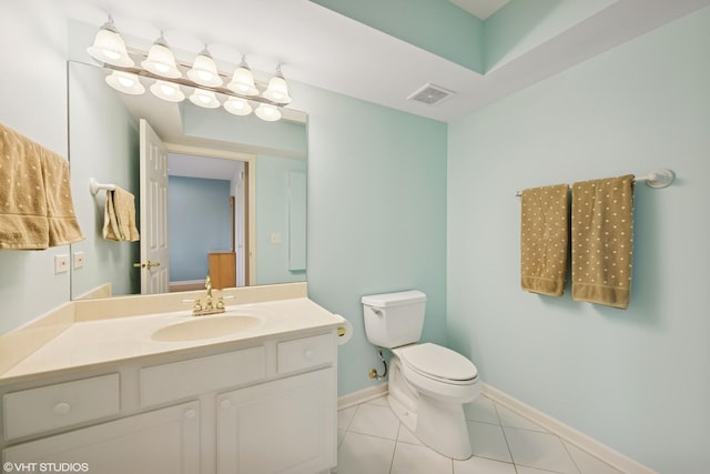 half bathroom with visible vents, baseboards, toilet, tile patterned floors, and vanity